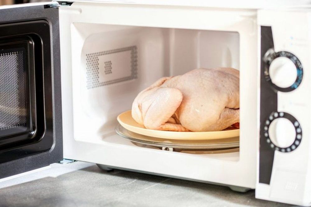 It is possible to use a microwave to thaw frozen raw chicken taken from the freezer