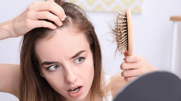 Hair Loss and Skin Flaking are common signs of Tinea Capitis.

