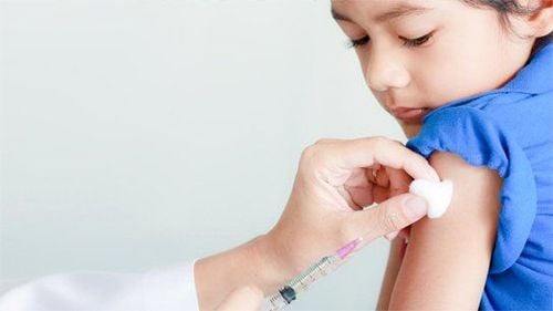 Preventing the disease by vaccinating children.