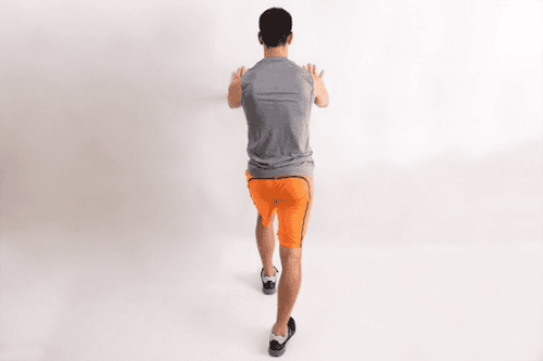 Bent-over wall press exercise